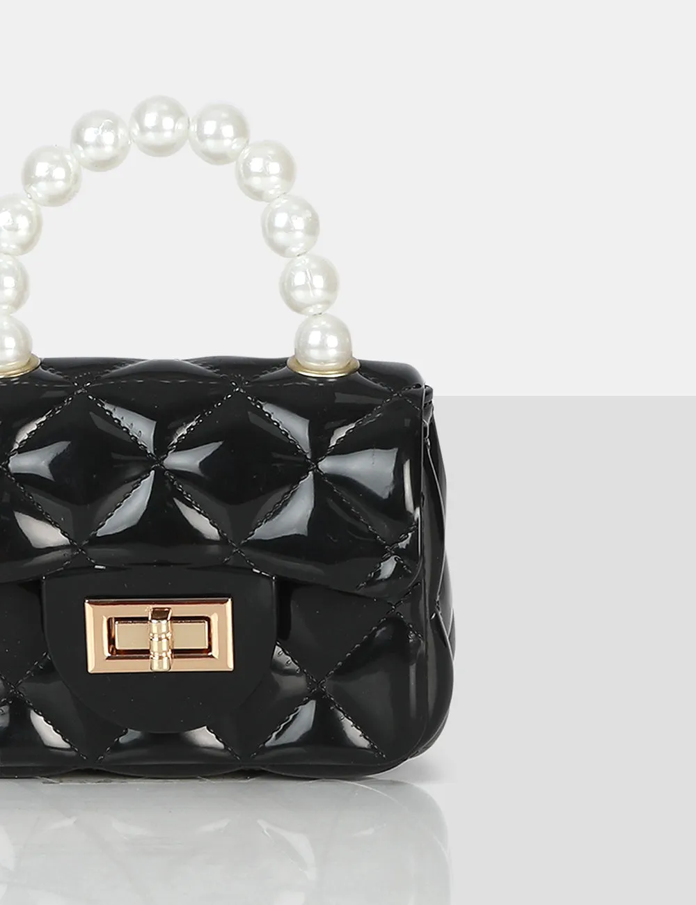 The Iddy Black Patent Pearl Mini Bag